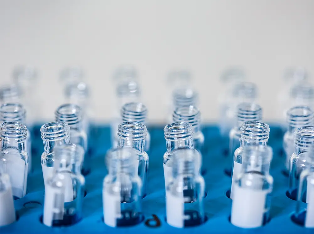 Glass vials in a laboratory.