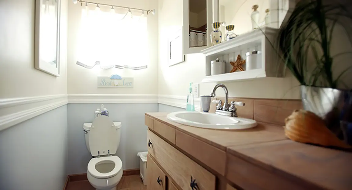 Bathroom with porcelain sink and toilet