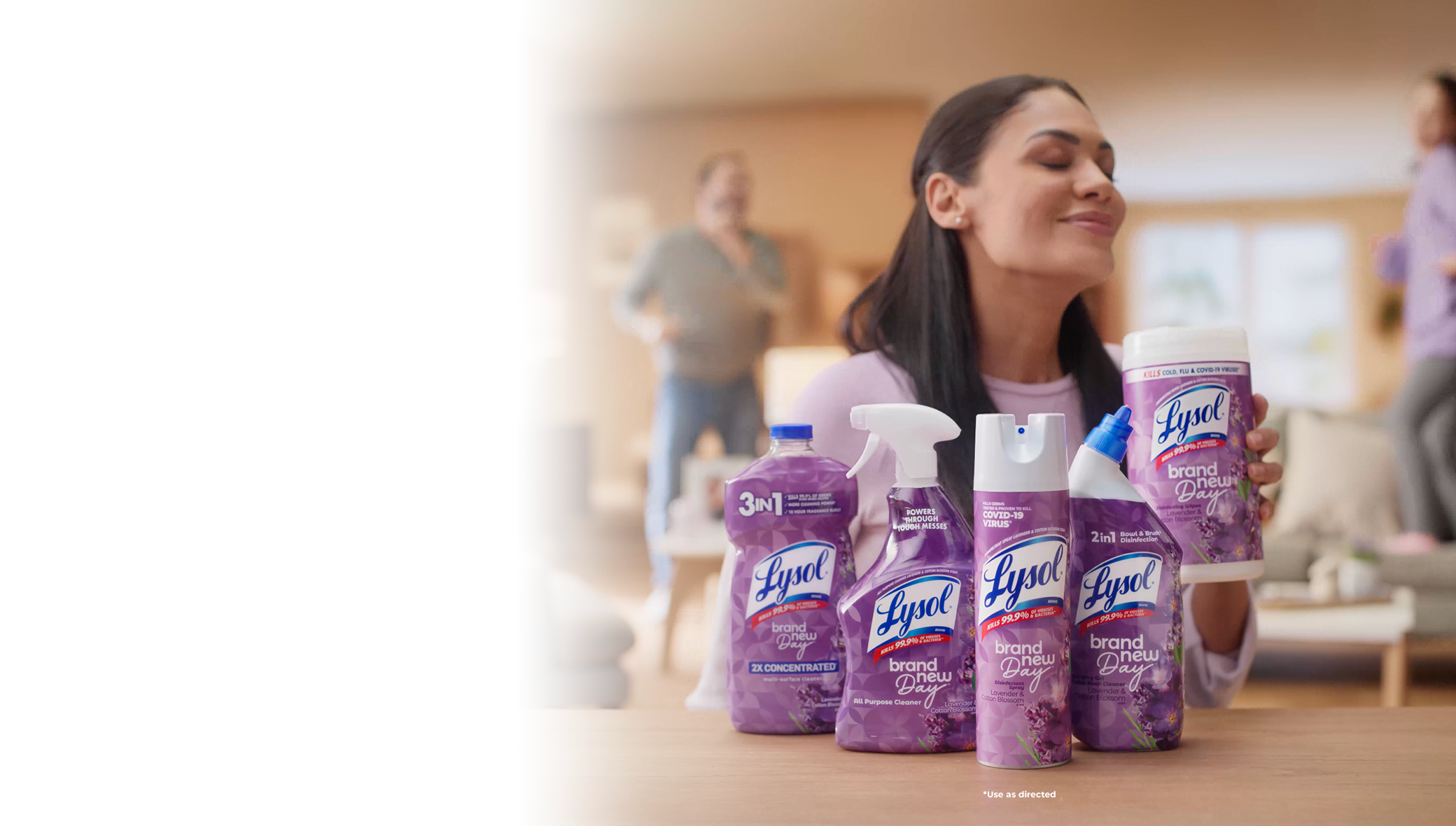 Women admiring scent of brand new day lavender and cotton blossom range of products
