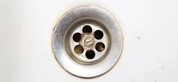 Close up of a shower drain