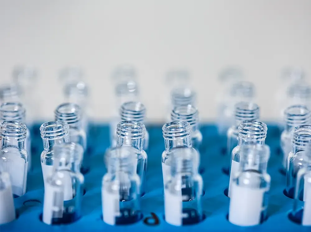 Glass vials in a laboratory.