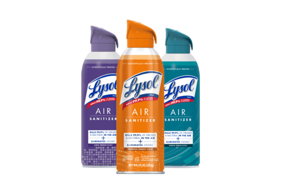 Three cans of Lysol air sanitizer in various scents displayed in a row.